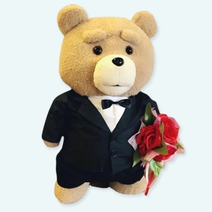 Avez-vous déjà pensé à offrir un ourson à l'amour de votre vie le jour de la Saint-Valentin ? Le célèbre ours en peluche Ted en costume avec un bouquet de fleurs ! Un cadeau parfait pour toute femme et qui rendra la vôtre très heureuse de recevoir cette peluche Ted super originale.