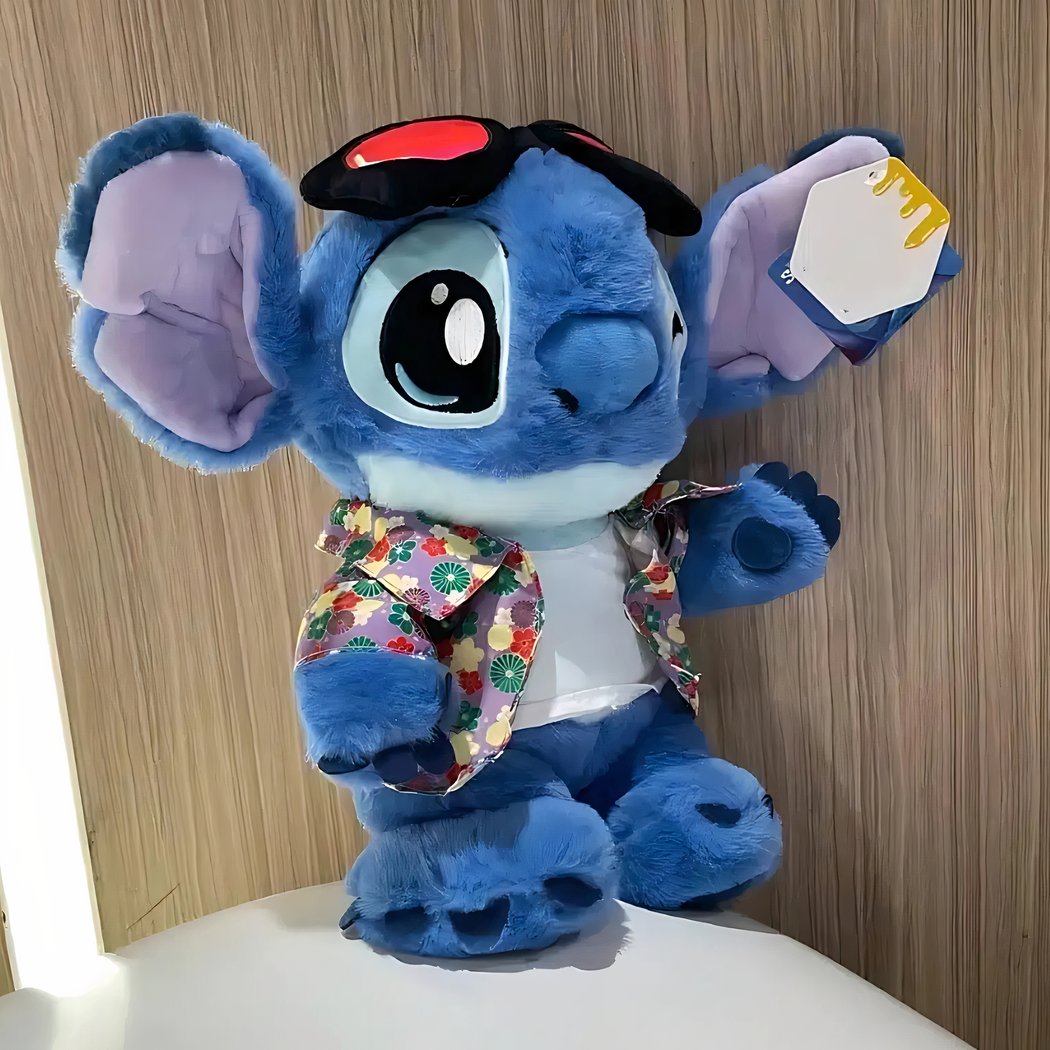 Petite Peluche Stitch Hawai chemise rouge à fleurs de Lilo et Stitch DISNEY